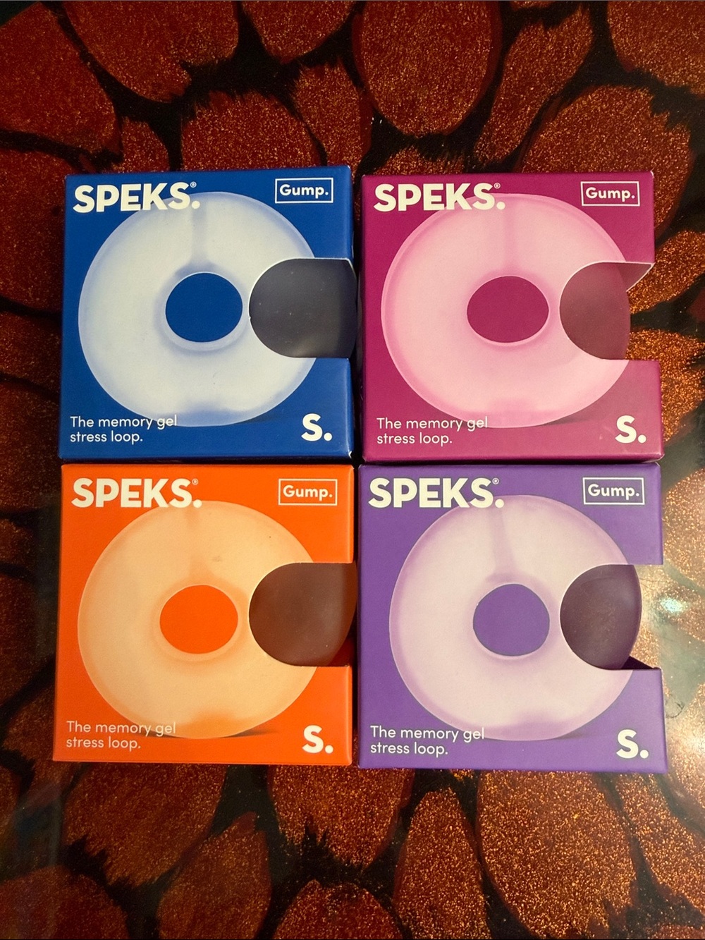 Speks Memory Gel Stress Loop - Blue, Pink, Orange, Purple (Set of 4)